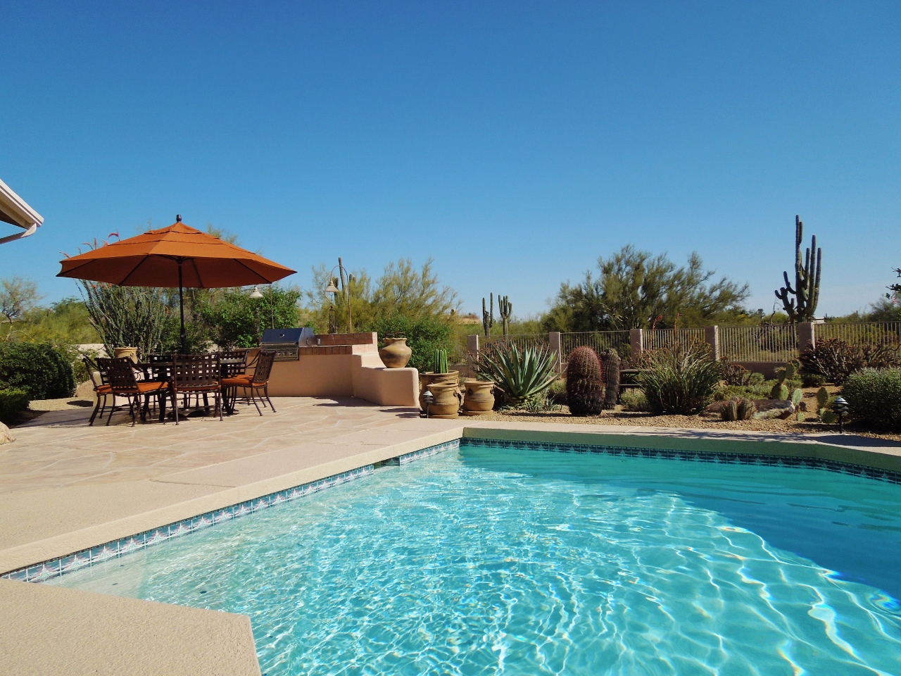 Scottsdale clouds floating in a Cave Creek pool